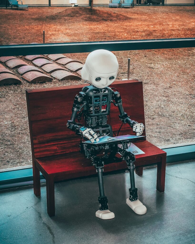 Laptop with AI interface representing making money with AI in 2026