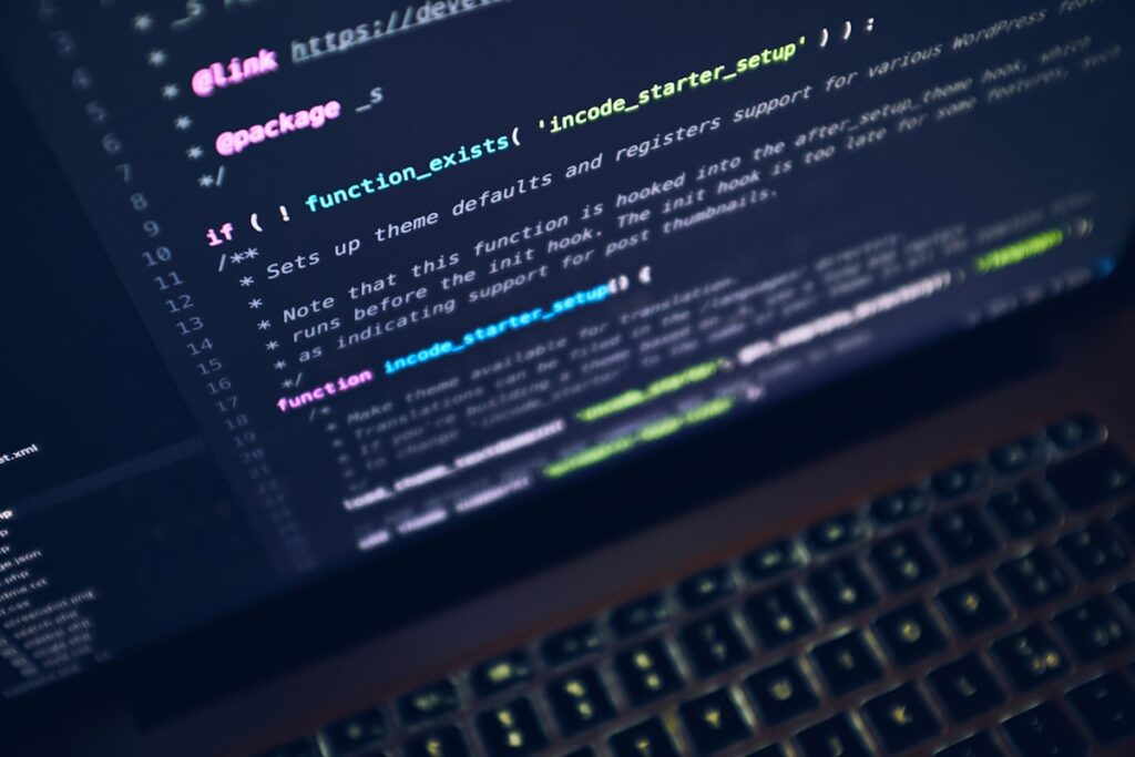 Developer working on laptop with global perspective